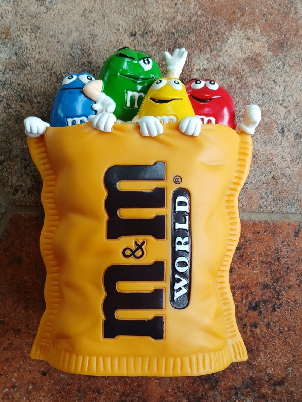 M&M'S Yellow Bank Figurine with Red, Green, Blue, and Yellow Characters